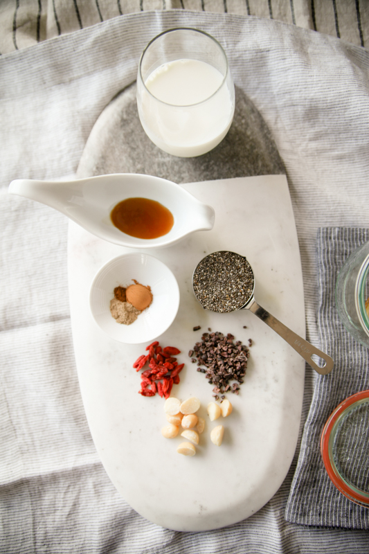 Maple Chai Chia Pudding ingredients on marble platter