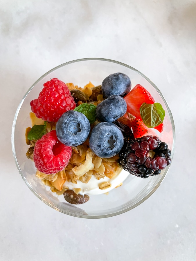 glass of yogurt with berries