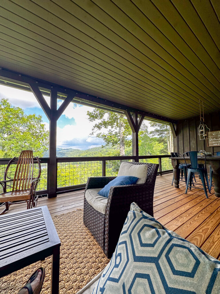 Kath Eats Blogger Kath Younger shares their Bear Lake Reserve vacation: in photo: the deck at Saddle Notch Villa #7